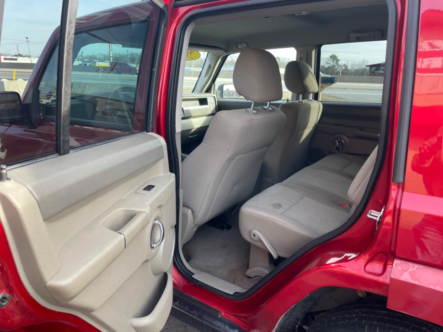 2010 Maroon Jeep Commander (1J4RH4GT5AC) with an V6, 3.7 Liter engine, Automatic, 5-Spd w/Overdrive transmission, located at 8008 Warden Rd, Sherwood, AR, 72120, (501) 801-6100, 34.830078, -92.186684 - Photo#10