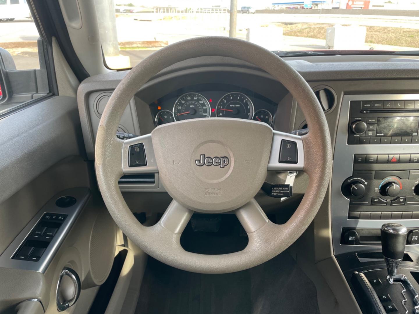 2010 Maroon Jeep Commander (1J4RH4GT5AC) with an V6, 3.7 Liter engine, Automatic, 5-Spd w/Overdrive transmission, located at 8008 Warden Rd, Sherwood, AR, 72120, (501) 801-6100, 34.830078, -92.186684 - Photo#15