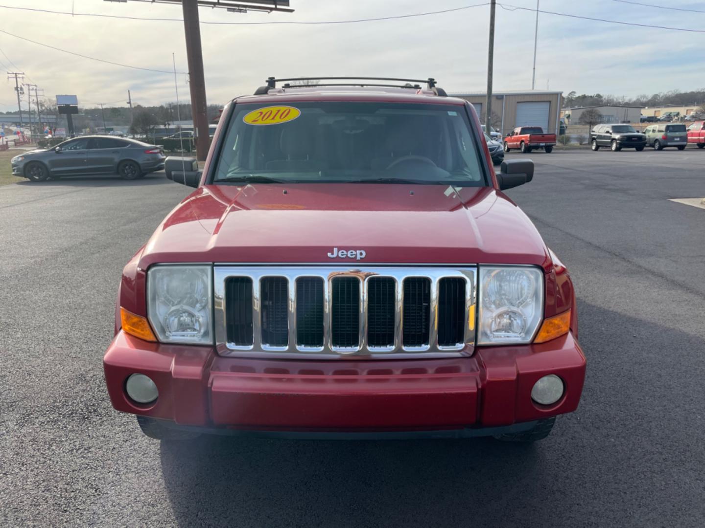 2010 Maroon Jeep Commander (1J4RH4GT5AC) with an V6, 3.7 Liter engine, Automatic, 5-Spd w/Overdrive transmission, located at 8008 Warden Rd, Sherwood, AR, 72120, (501) 801-6100, 34.830078, -92.186684 - Photo#2