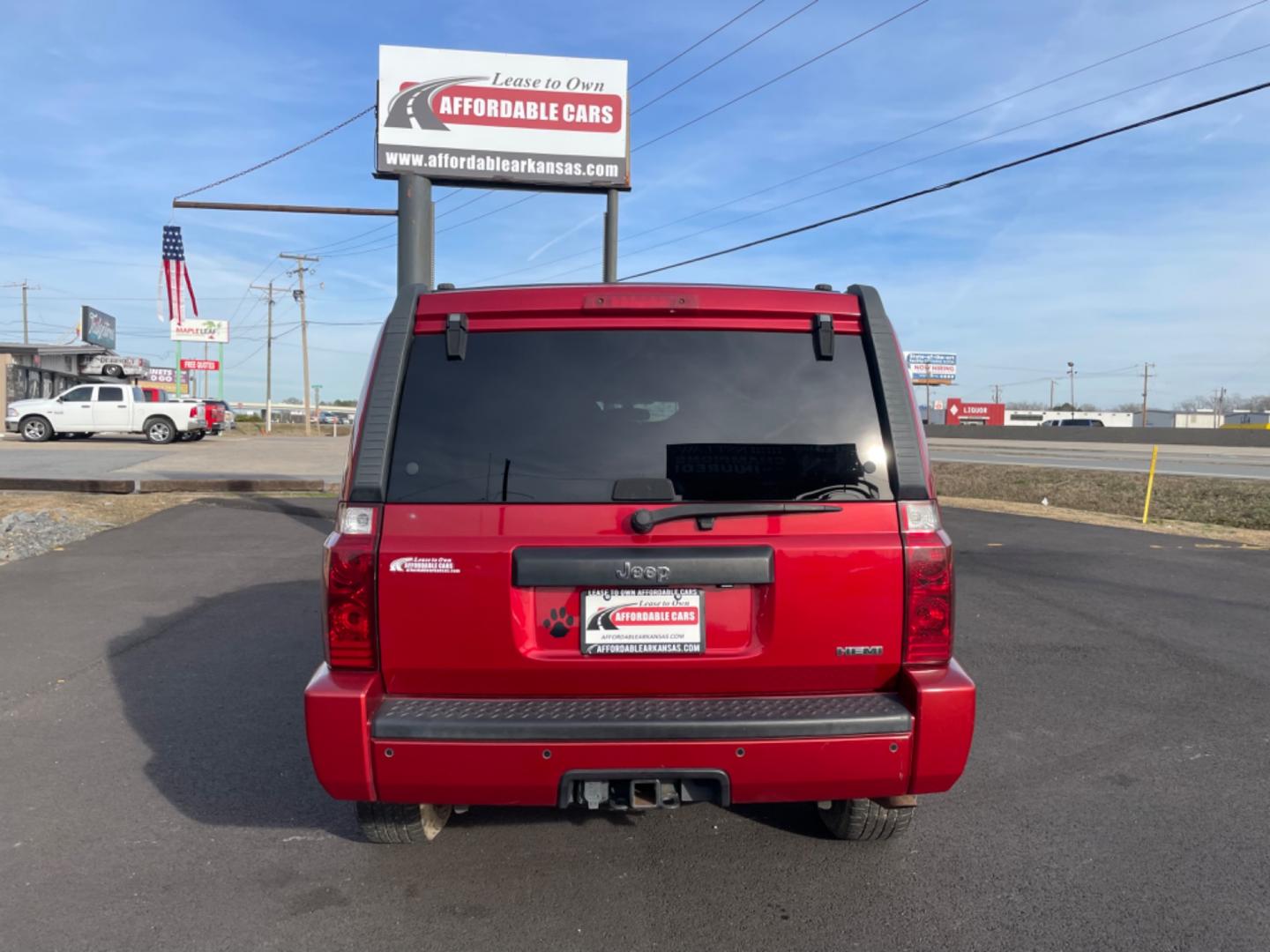 2010 Maroon Jeep Commander (1J4RH4GT5AC) with an V6, 3.7 Liter engine, Automatic, 5-Spd w/Overdrive transmission, located at 8008 Warden Rd, Sherwood, AR, 72120, (501) 801-6100, 34.830078, -92.186684 - Photo#6