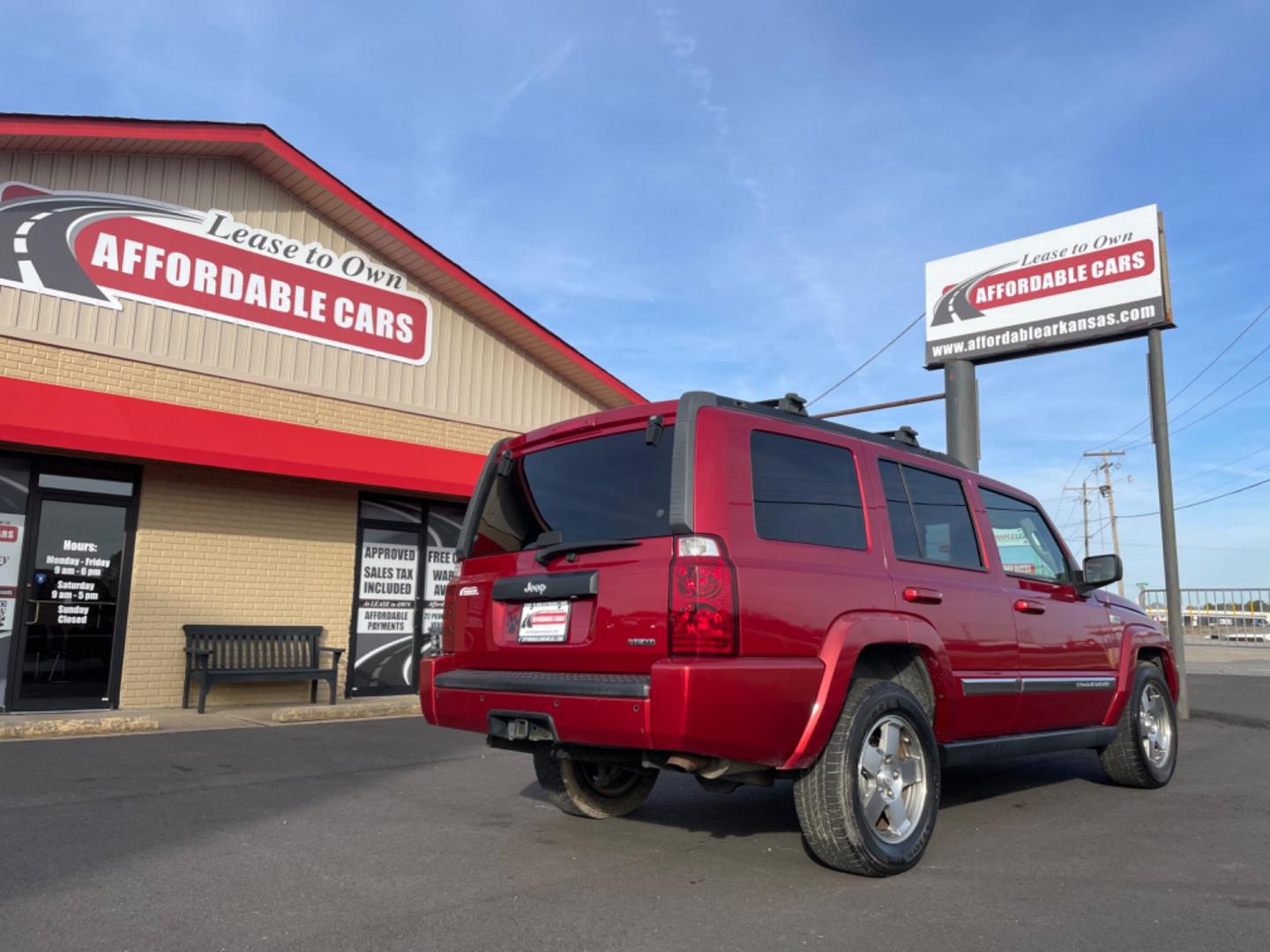 2010 Maroon Jeep Commander (1J4RH4GT5AC) with an V6, 3.7 Liter engine, Automatic, 5-Spd w/Overdrive transmission, located at 8008 Warden Rd, Sherwood, AR, 72120, (501) 801-6100, 34.830078, -92.186684 - Photo#7