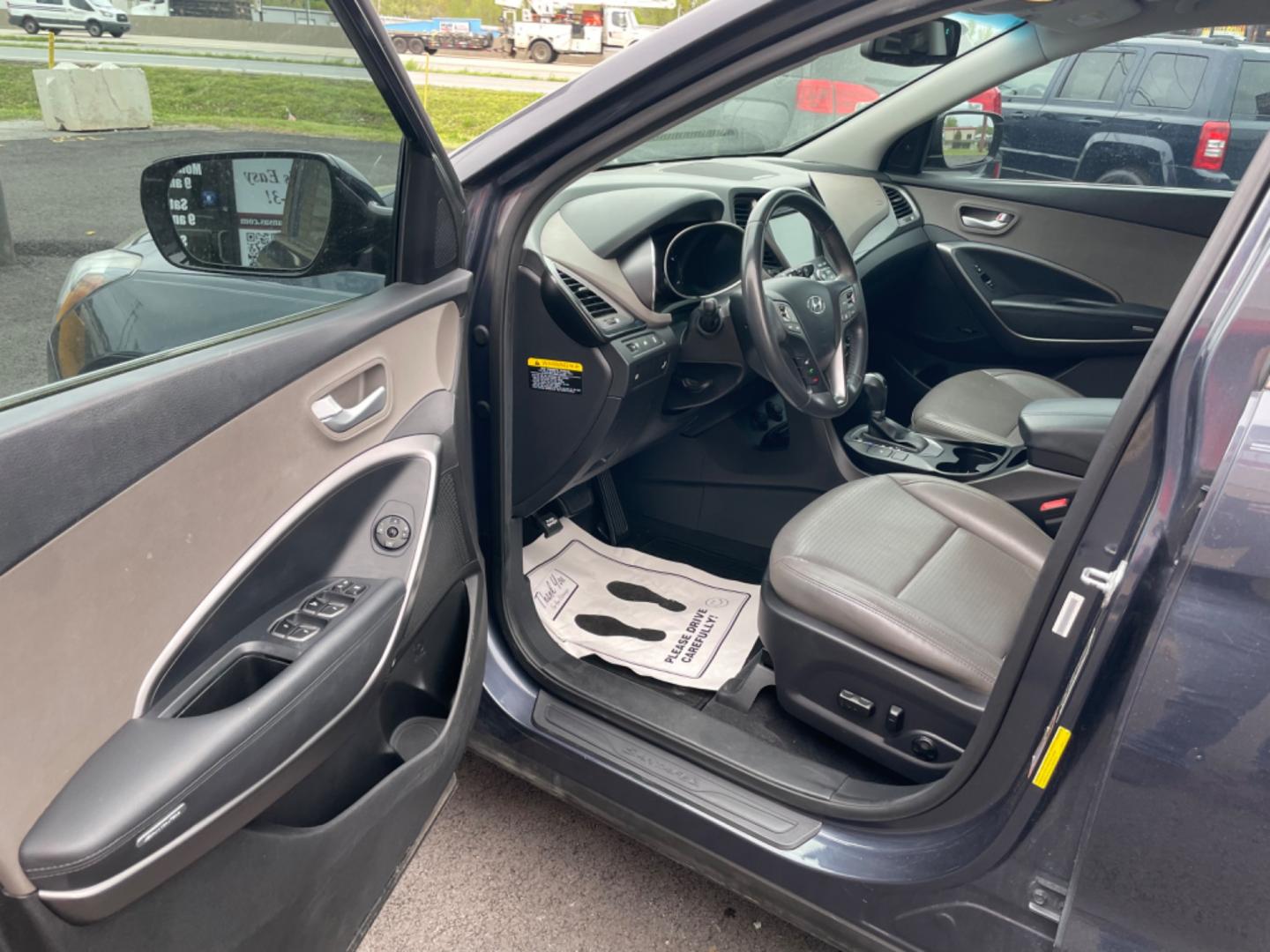 2014 Blue Hyundai Santa Fe Sport (5XYZU3LA0EG) with an 4-Cyl, Turbo, GDI, 2.0L engine, Auto, 6-Spd Shftrnc transmission, located at 8008 Warden Rd, Sherwood, AR, 72120, (501) 801-6100, 34.830078, -92.186684 - Photo#12