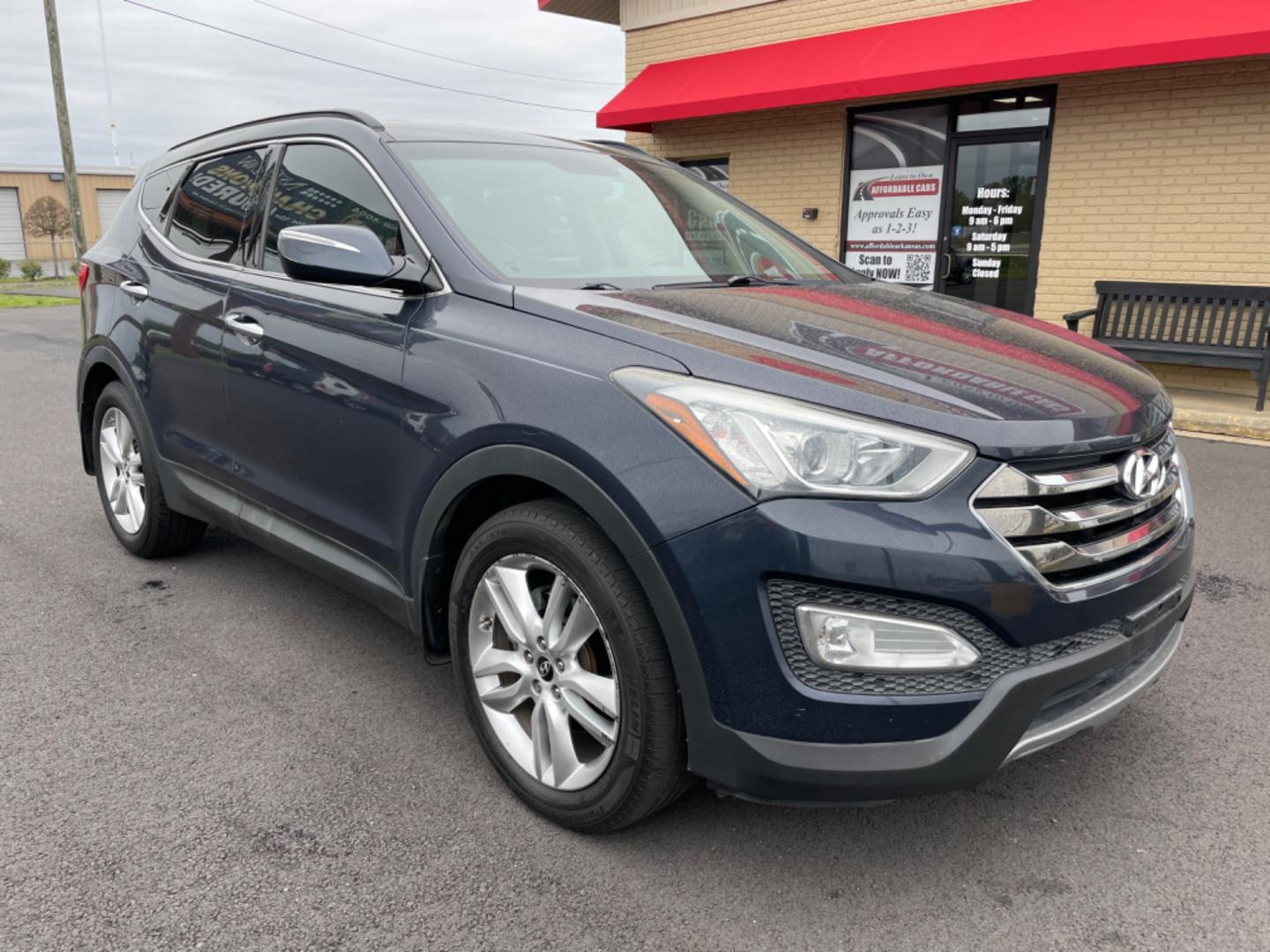 2014 Blue Hyundai Santa Fe Sport (5XYZU3LA0EG) with an 4-Cyl, Turbo, GDI, 2.0L engine, Auto, 6-Spd Shftrnc transmission, located at 8008 Warden Rd, Sherwood, AR, 72120, (501) 801-6100, 34.830078, -92.186684 - Photo#1