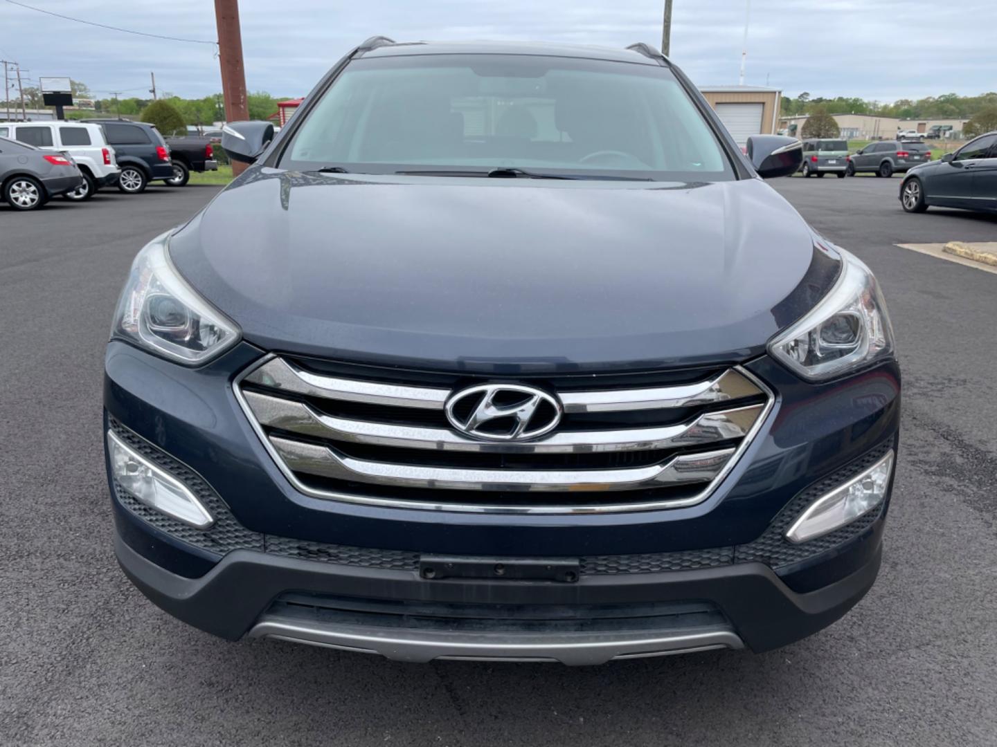 2014 Blue Hyundai Santa Fe Sport (5XYZU3LA0EG) with an 4-Cyl, Turbo, GDI, 2.0L engine, Auto, 6-Spd Shftrnc transmission, located at 8008 Warden Rd, Sherwood, AR, 72120, (501) 801-6100, 34.830078, -92.186684 - Photo#2