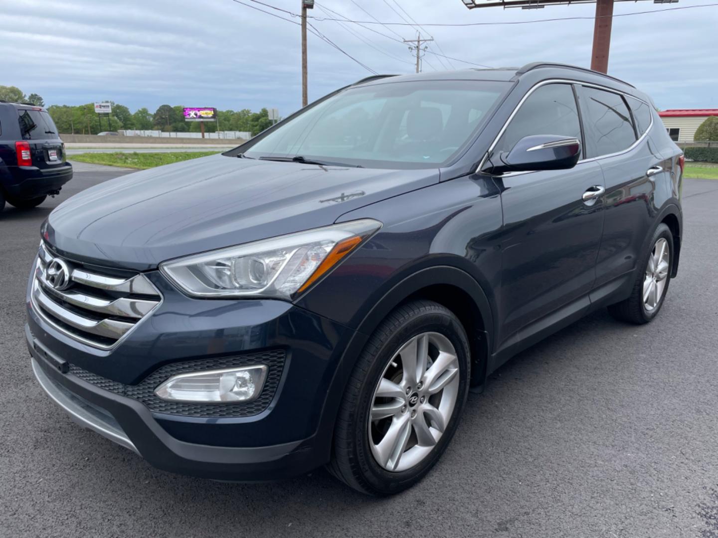 2014 Blue Hyundai Santa Fe Sport (5XYZU3LA0EG) with an 4-Cyl, Turbo, GDI, 2.0L engine, Auto, 6-Spd Shftrnc transmission, located at 8008 Warden Rd, Sherwood, AR, 72120, (501) 801-6100, 34.830078, -92.186684 - Photo#3