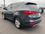 2014 Blue Hyundai Santa Fe Sport (5XYZU3LA0EG) with an 4-Cyl, Turbo, GDI, 2.0L engine, Auto, 6-Spd Shftrnc transmission, located at 8008 Warden Rd, Sherwood, AR, 72120, (501) 801-6100, 34.830078, -92.186684 - Photo#5