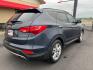 2014 Blue Hyundai Santa Fe Sport (5XYZU3LA0EG) with an 4-Cyl, Turbo, GDI, 2.0L engine, Auto, 6-Spd Shftrnc transmission, located at 8008 Warden Rd, Sherwood, AR, 72120, (501) 801-6100, 34.830078, -92.186684 - Photo#7