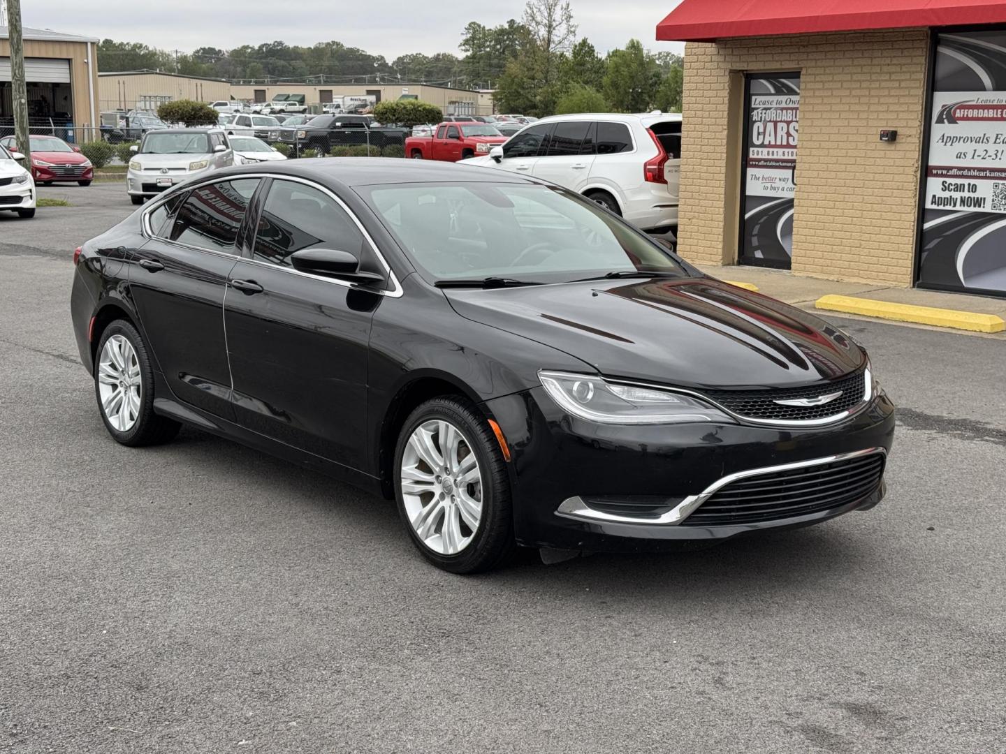 2015 Black Chrysler 200 (1C3CCCAB7FN) with an 4-Cyl, MultiAir, 2.4L engine, Automatic, 9-Spd transmission, located at 8008 Warden Rd, Sherwood, AR, 72120, (501) 801-6100, 34.830078, -92.186684 - Photo#1