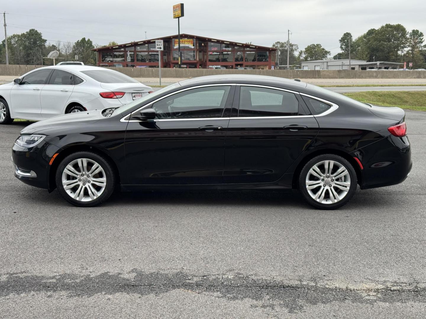 2015 Black Chrysler 200 (1C3CCCAB7FN) with an 4-Cyl, MultiAir, 2.4L engine, Automatic, 9-Spd transmission, located at 8008 Warden Rd, Sherwood, AR, 72120, (501) 801-6100, 34.830078, -92.186684 - Photo#4