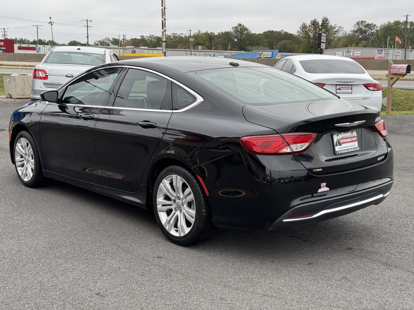 2015 Black Chrysler 200 (1C3CCCAB7FN) with an 4-Cyl, MultiAir, 2.4L engine, Automatic, 9-Spd transmission, located at 8008 Warden Rd, Sherwood, AR, 72120, (501) 801-6100, 34.830078, -92.186684 - Photo#5