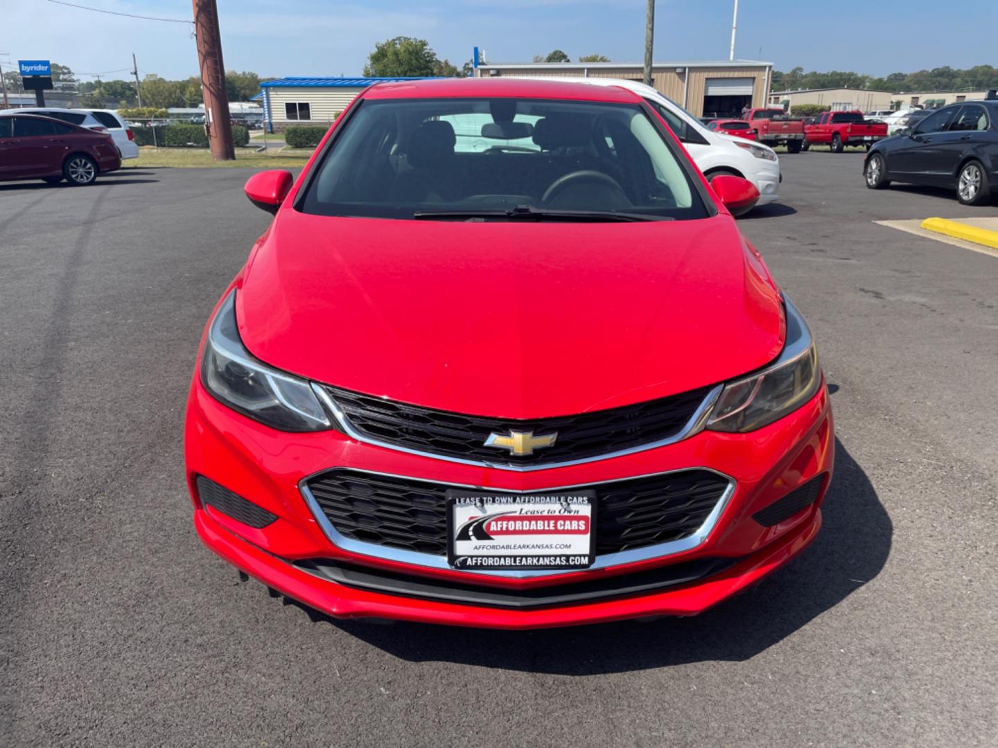 2017 Red Chevrolet Cruze (3G1BE6SM9HS) with an 4-Cyl, Turbo, 1.4 Liter engine, Automatic, 6-Spd transmission, located at 8008 Warden Rd, Sherwood, AR, 72120, (501) 801-6100, 34.830078, -92.186684 - Photo#2