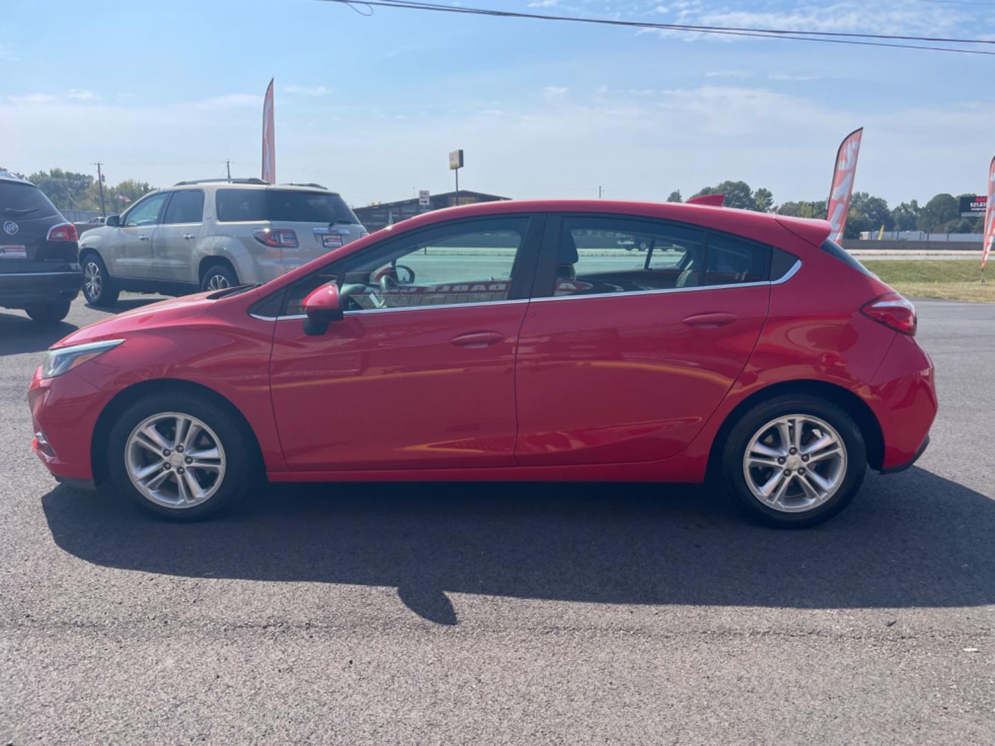 2017 Red Chevrolet Cruze (3G1BE6SM9HS) with an 4-Cyl, Turbo, 1.4 Liter engine, Automatic, 6-Spd transmission, located at 8008 Warden Rd, Sherwood, AR, 72120, (501) 801-6100, 34.830078, -92.186684 - Photo#4