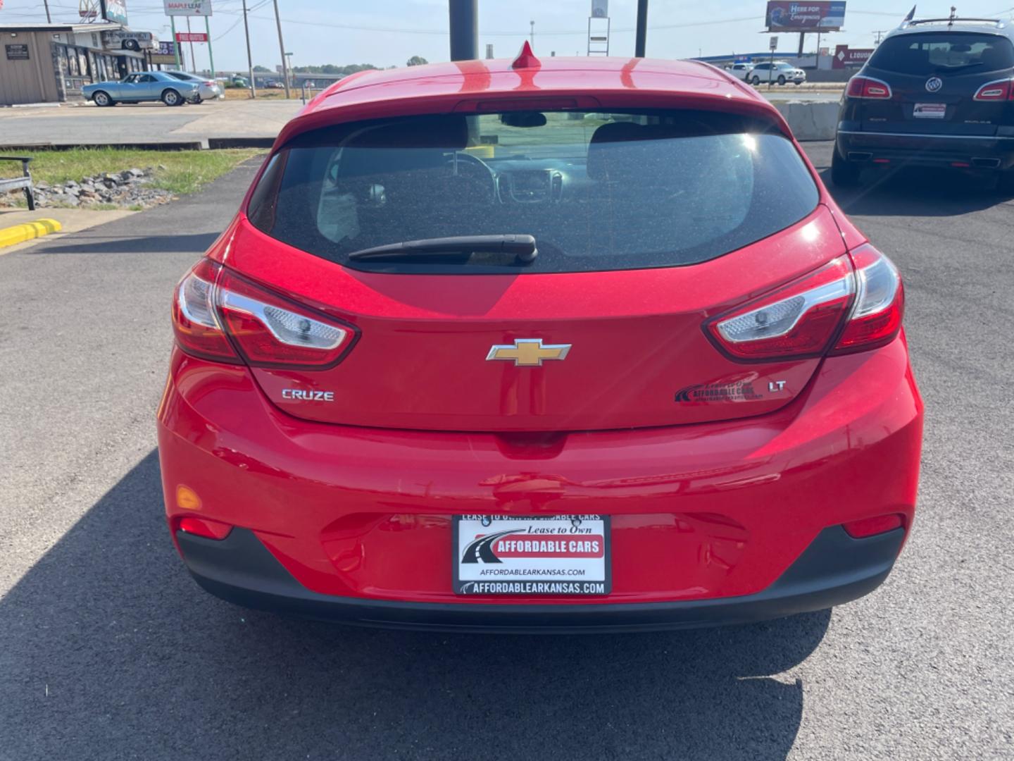 2017 Red Chevrolet Cruze (3G1BE6SM9HS) with an 4-Cyl, Turbo, 1.4 Liter engine, Automatic, 6-Spd transmission, located at 8008 Warden Rd, Sherwood, AR, 72120, (501) 801-6100, 34.830078, -92.186684 - Photo#6