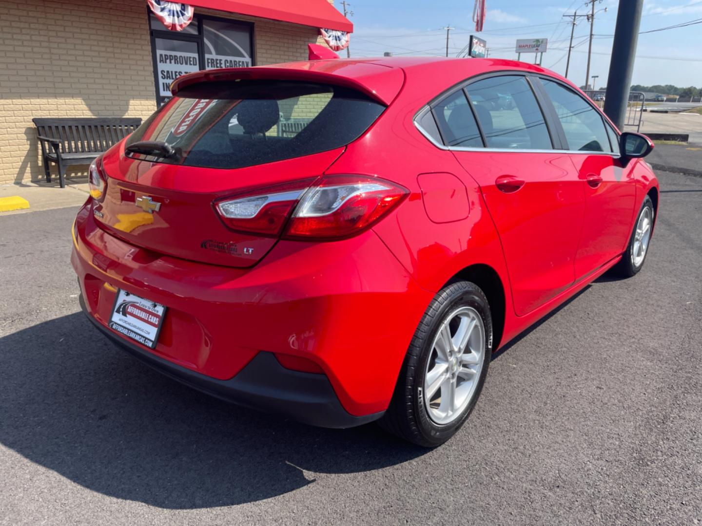 2017 Red Chevrolet Cruze (3G1BE6SM9HS) with an 4-Cyl, Turbo, 1.4 Liter engine, Automatic, 6-Spd transmission, located at 8008 Warden Rd, Sherwood, AR, 72120, (501) 801-6100, 34.830078, -92.186684 - Photo#7