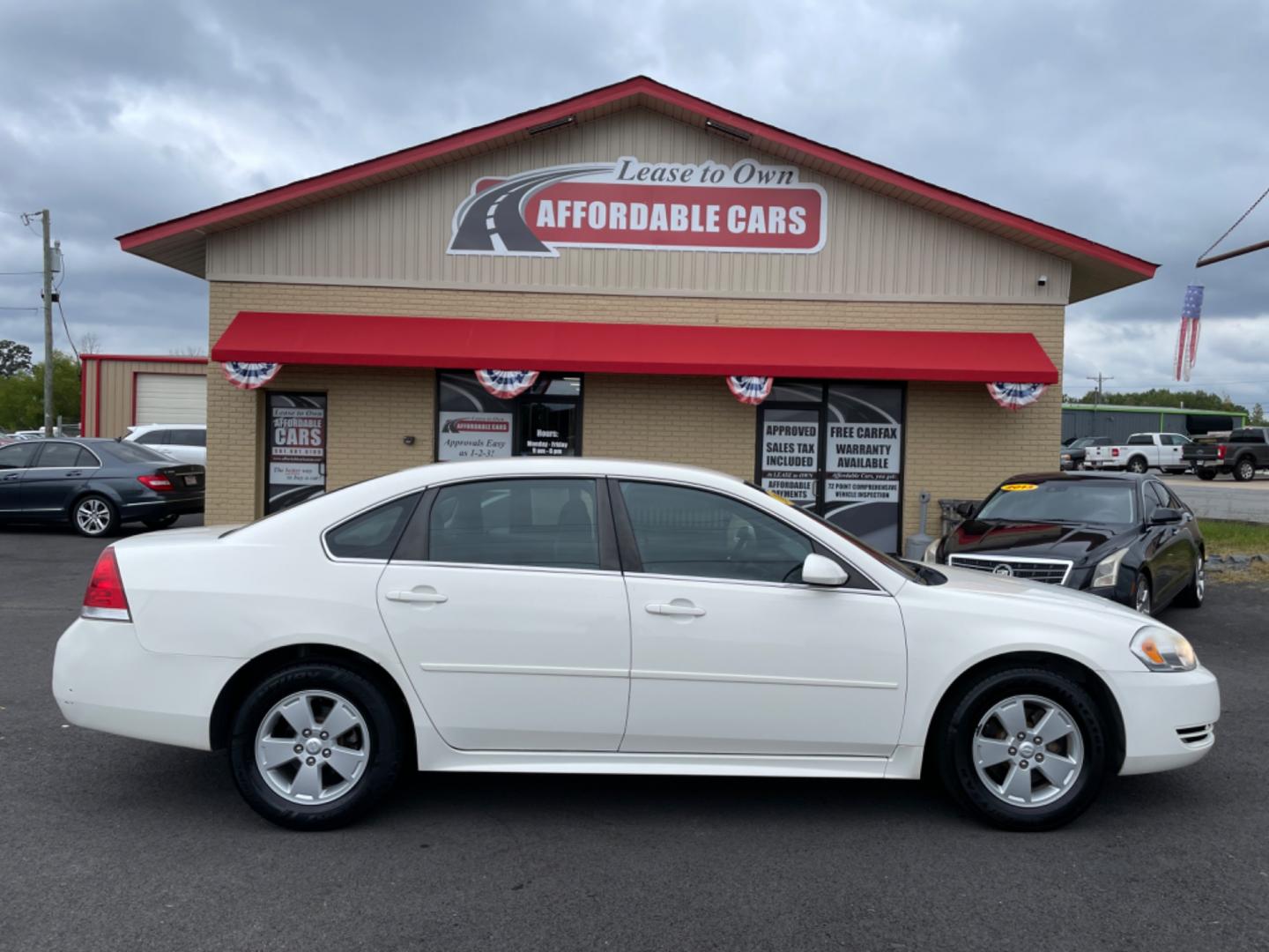 2009 White Chevrolet Impala (2G1WT57K591) with an V6, 3.5 Liter engine, Automatic, 4-Spd w/Overdrive transmission, located at 8008 Warden Rd, Sherwood, AR, 72120, (501) 801-6100, 34.830078, -92.186684 - Photo#0