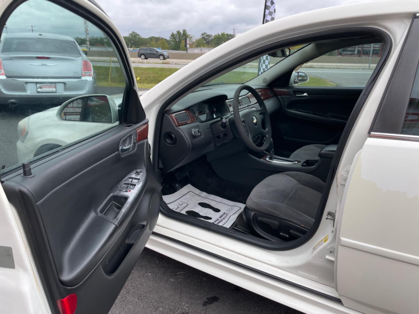 2009 White Chevrolet Impala (2G1WT57K591) with an V6, 3.5 Liter engine, Automatic, 4-Spd w/Overdrive transmission, located at 8008 Warden Rd, Sherwood, AR, 72120, (501) 801-6100, 34.830078, -92.186684 - Photo#12