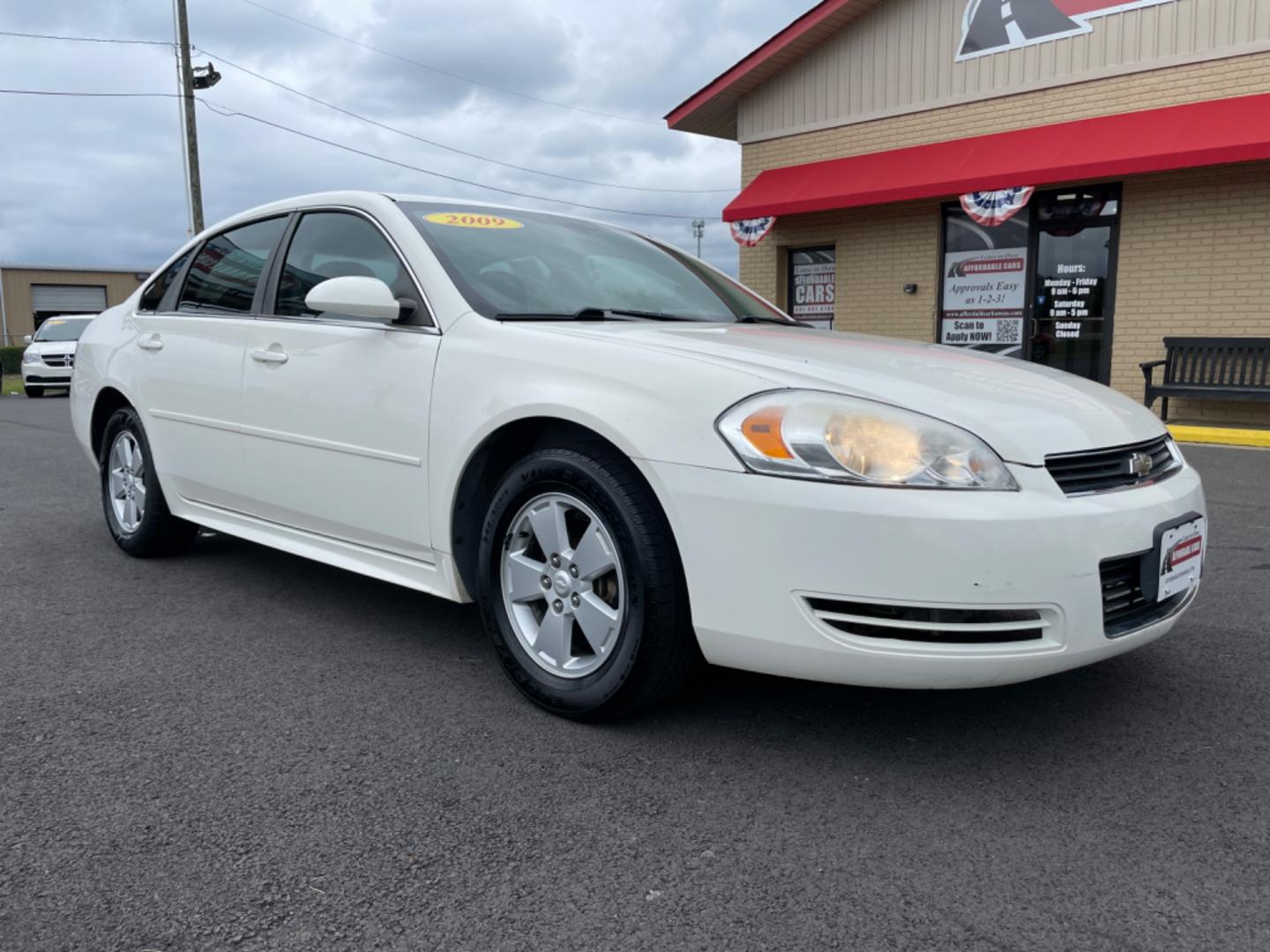 2009 White Chevrolet Impala (2G1WT57K591) with an V6, 3.5 Liter engine, Automatic, 4-Spd w/Overdrive transmission, located at 8008 Warden Rd, Sherwood, AR, 72120, (501) 801-6100, 34.830078, -92.186684 - Photo#1