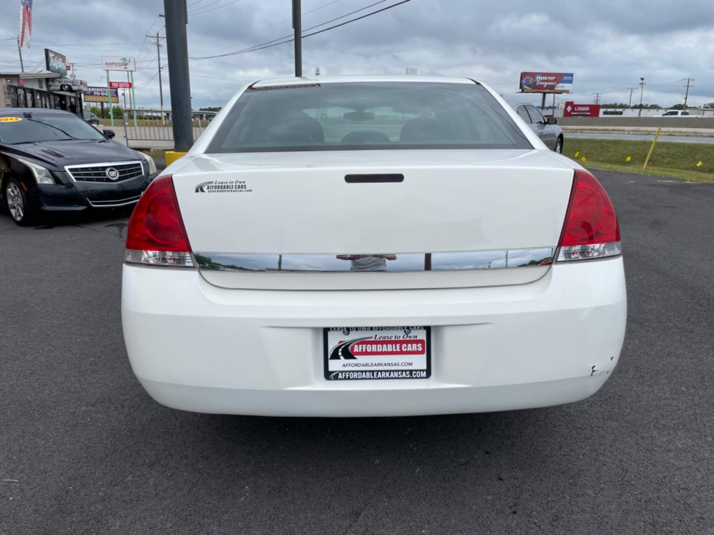 2009 White Chevrolet Impala (2G1WT57K591) with an V6, 3.5 Liter engine, Automatic, 4-Spd w/Overdrive transmission, located at 8008 Warden Rd, Sherwood, AR, 72120, (501) 801-6100, 34.830078, -92.186684 - Photo#6