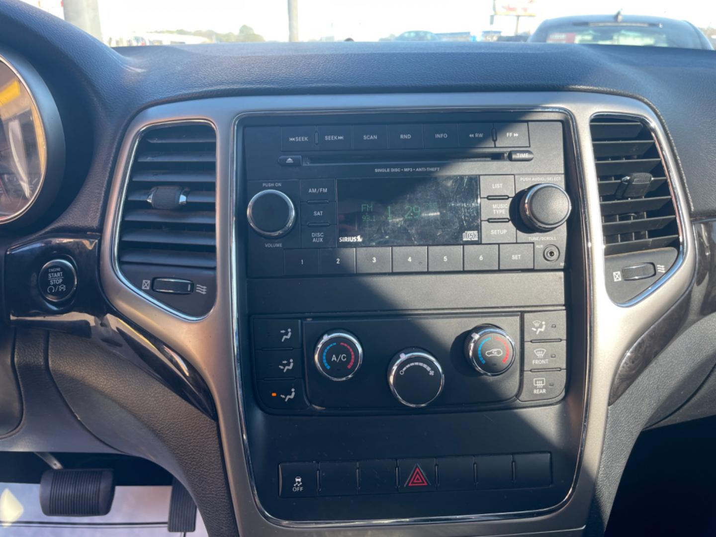 2012 Black Jeep Grand Cherokee (1C4RJFAG9CC) with an V6, Flex Fuel, 3.6 Liter engine, Automatic, 5-Spd transmission, located at 8008 Warden Rd, Sherwood, AR, 72120, (501) 801-6100, 34.830078, -92.186684 - Photo#21