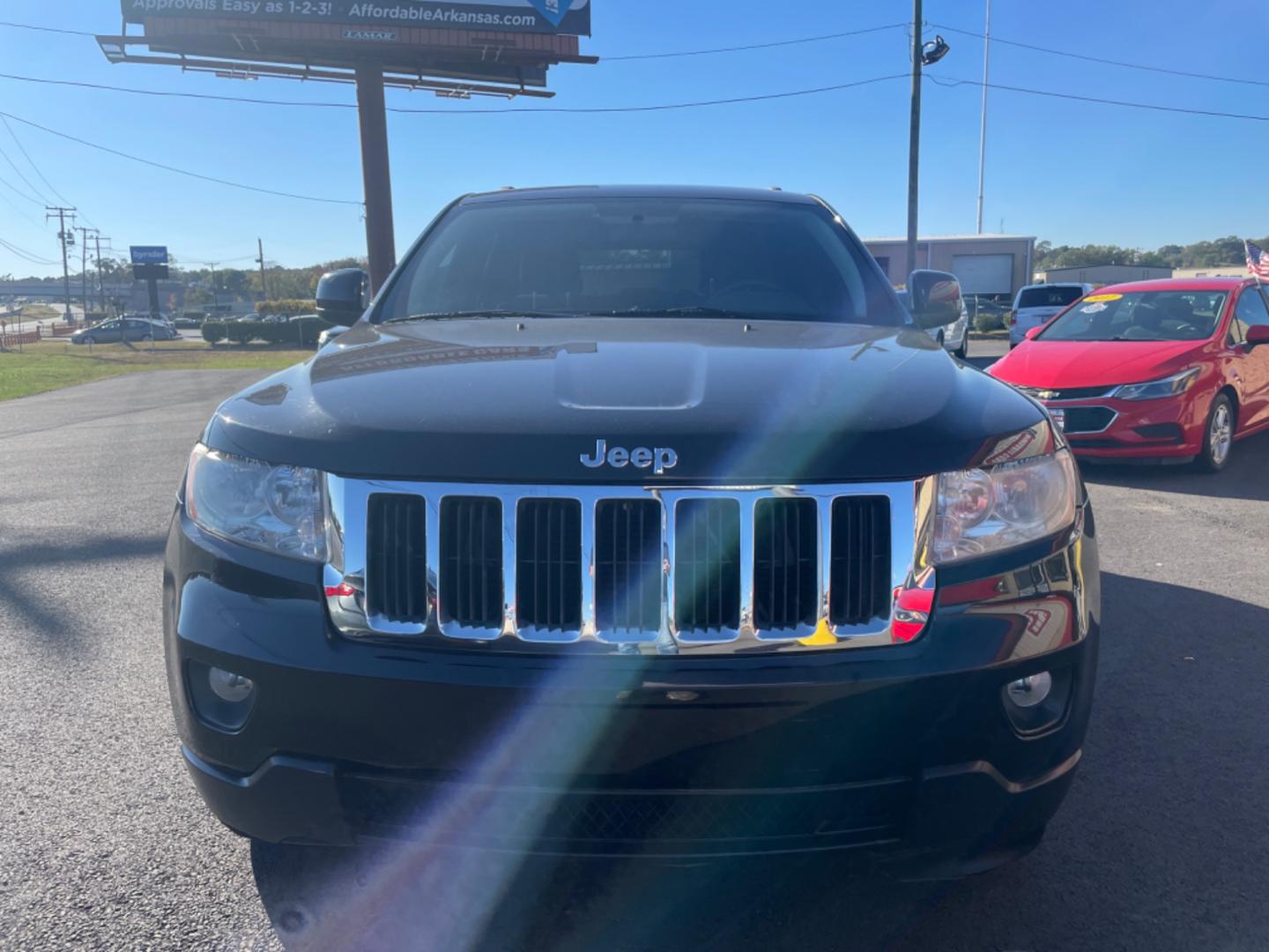 2012 Black Jeep Grand Cherokee (1C4RJFAG9CC) with an V6, Flex Fuel, 3.6 Liter engine, Automatic, 5-Spd transmission, located at 8008 Warden Rd, Sherwood, AR, 72120, (501) 801-6100, 34.830078, -92.186684 - Photo#2