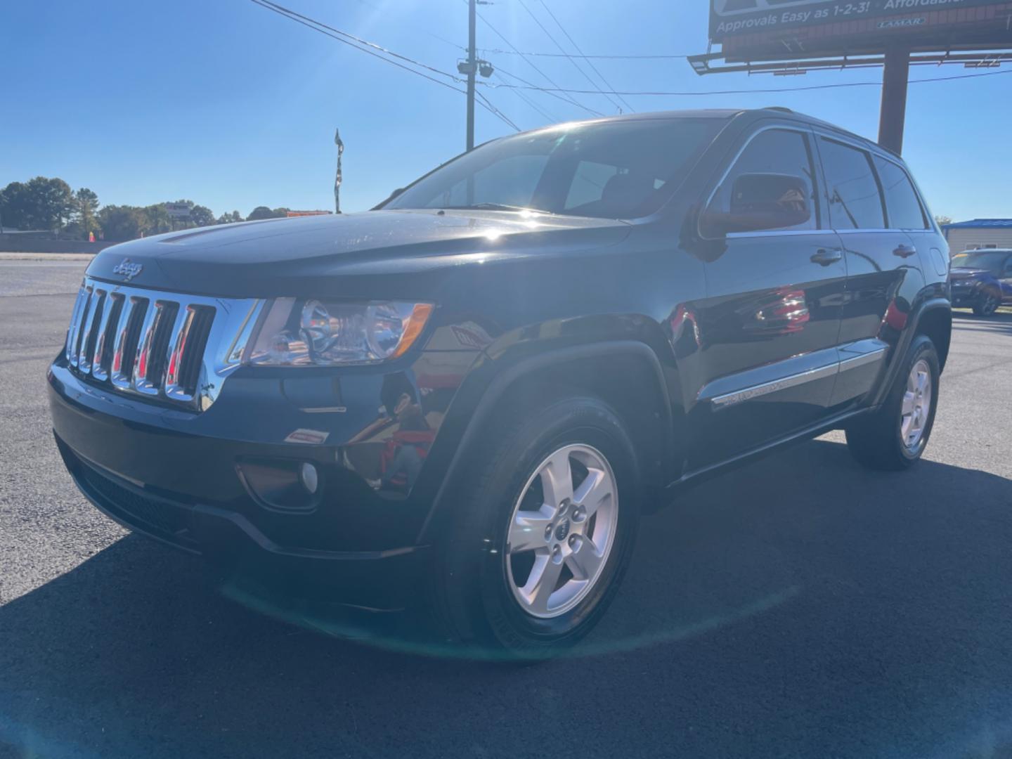 2012 Black Jeep Grand Cherokee (1C4RJFAG9CC) with an V6, Flex Fuel, 3.6 Liter engine, Automatic, 5-Spd transmission, located at 8008 Warden Rd, Sherwood, AR, 72120, (501) 801-6100, 34.830078, -92.186684 - Photo#3