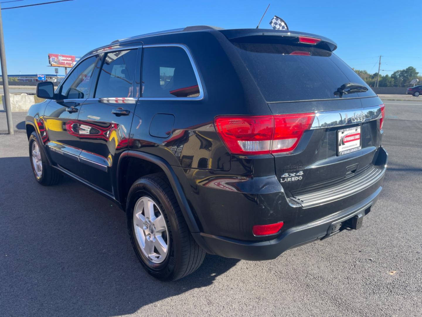 2012 Black Jeep Grand Cherokee (1C4RJFAG9CC) with an V6, Flex Fuel, 3.6 Liter engine, Automatic, 5-Spd transmission, located at 8008 Warden Rd, Sherwood, AR, 72120, (501) 801-6100, 34.830078, -92.186684 - Photo#5