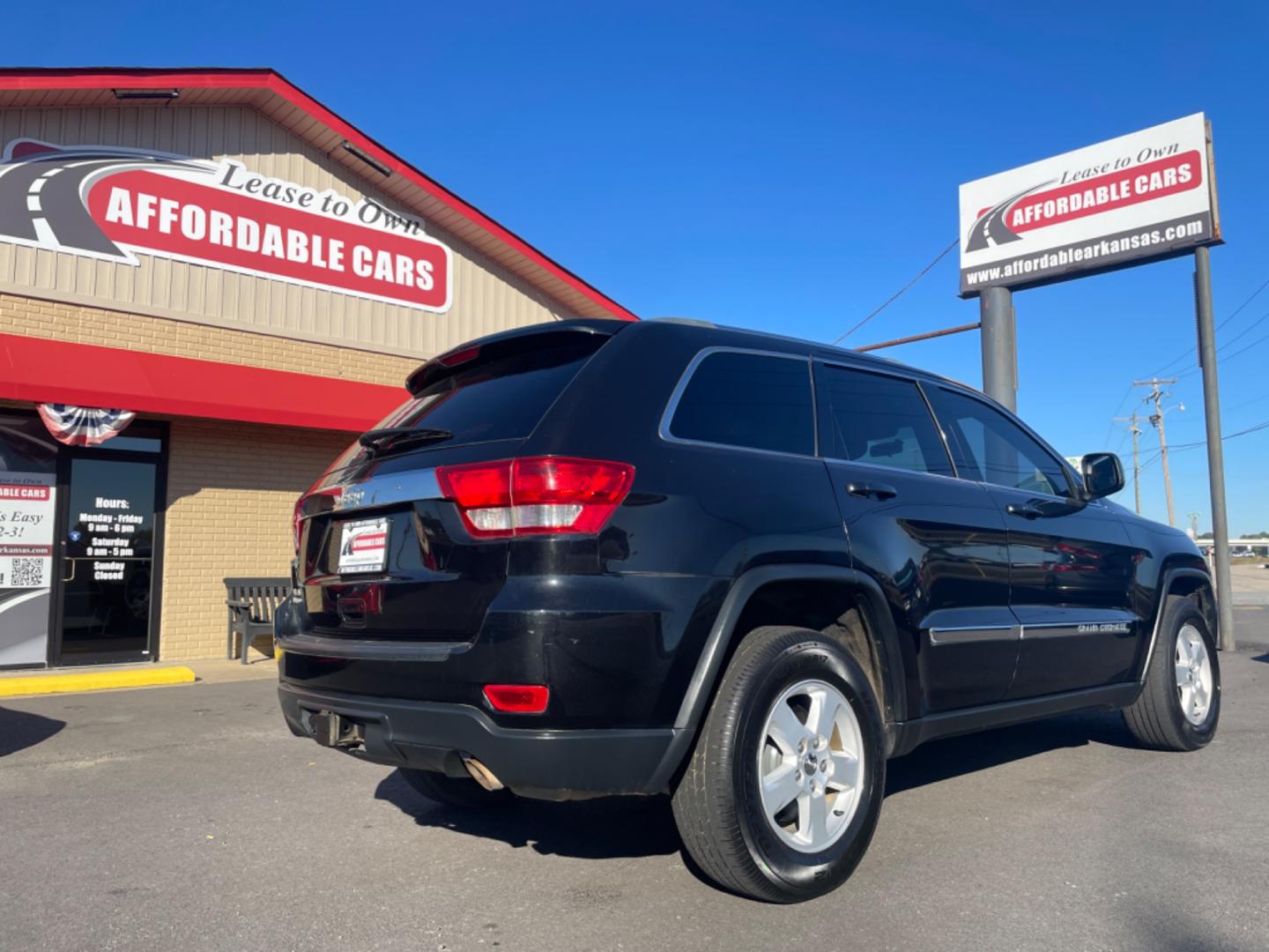 2012 Black Jeep Grand Cherokee (1C4RJFAG9CC) with an V6, Flex Fuel, 3.6 Liter engine, Automatic, 5-Spd transmission, located at 8008 Warden Rd, Sherwood, AR, 72120, (501) 801-6100, 34.830078, -92.186684 - Photo#7