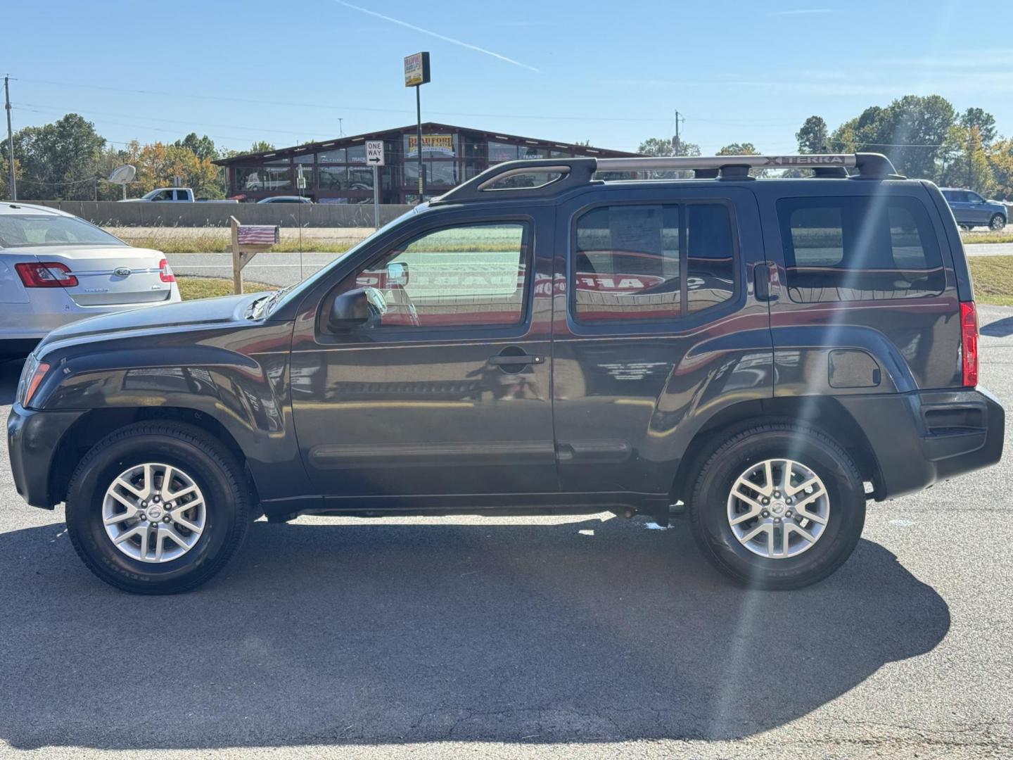 2014 Black Nissan Xterra (5N1AN0NU9EN) with an V6, 4.0 Liter engine, Automatic, 5-Spd transmission, located at 8008 Warden Rd, Sherwood, AR, 72120, (501) 801-6100, 34.830078, -92.186684 - Photo#2