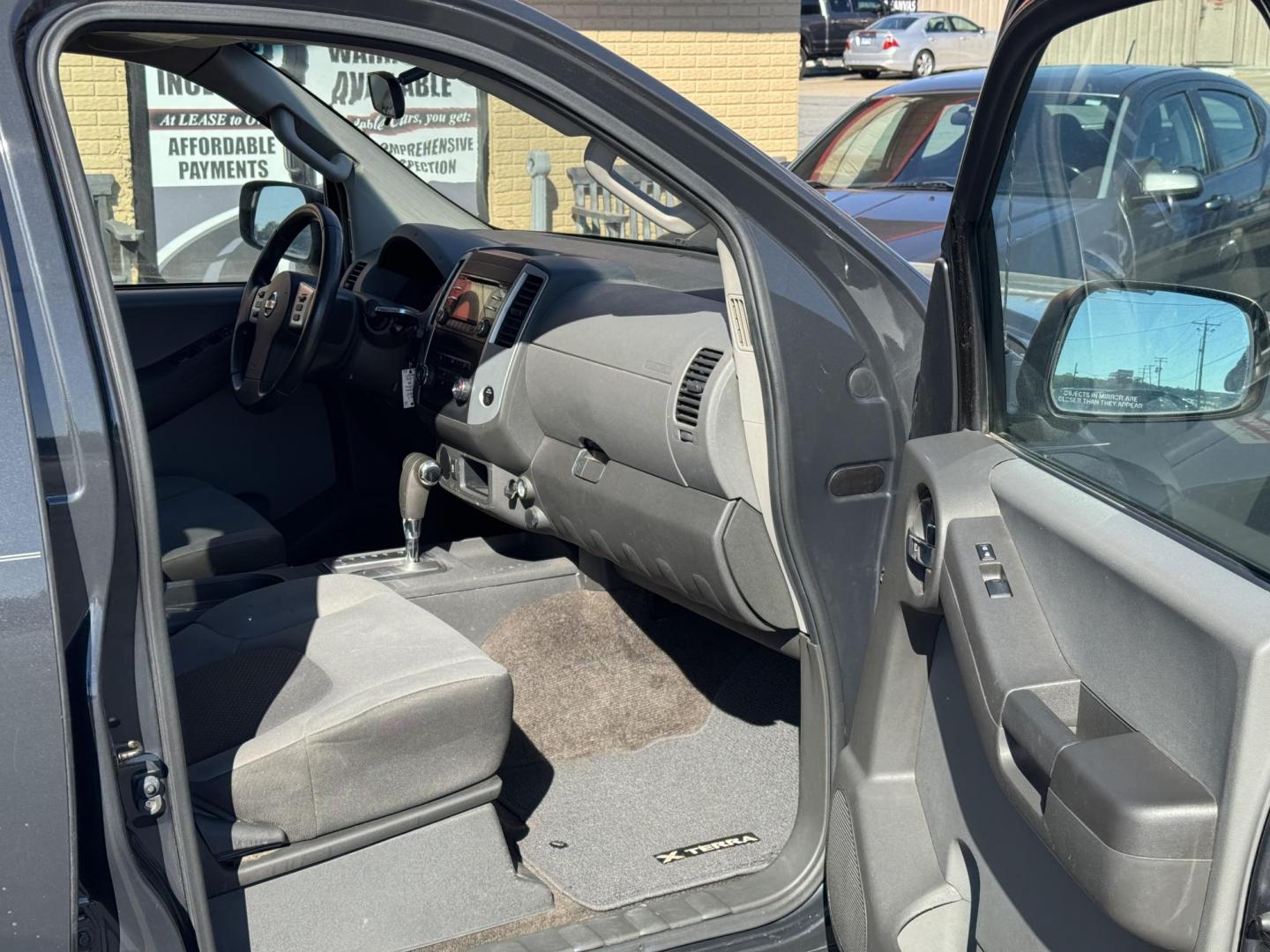 2014 Black Nissan Xterra (5N1AN0NU9EN) with an V6, 4.0 Liter engine, Automatic, 5-Spd transmission, located at 8008 Warden Rd, Sherwood, AR, 72120, (501) 801-6100, 34.830078, -92.186684 - Photo#8