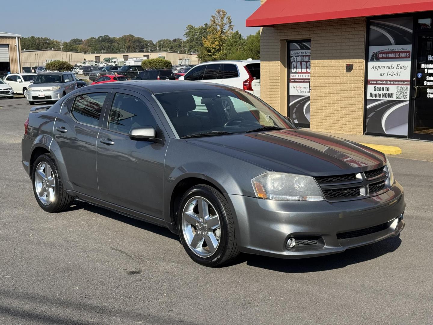 2013 Silver Dodge Avenger (1C3CDZCB9DN) with an 4-Cyl, 2.4 Liter engine, Automatic, 6-Spd w/AutoStick transmission, located at 8008 Warden Rd, Sherwood, AR, 72120, (501) 801-6100, 34.830078, -92.186684 - Photo#1