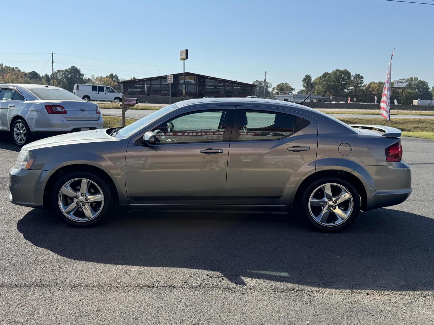 2013 Silver Dodge Avenger (1C3CDZCB9DN) with an 4-Cyl, 2.4 Liter engine, Automatic, 6-Spd w/AutoStick transmission, located at 8008 Warden Rd, Sherwood, AR, 72120, (501) 801-6100, 34.830078, -92.186684 - Photo#4