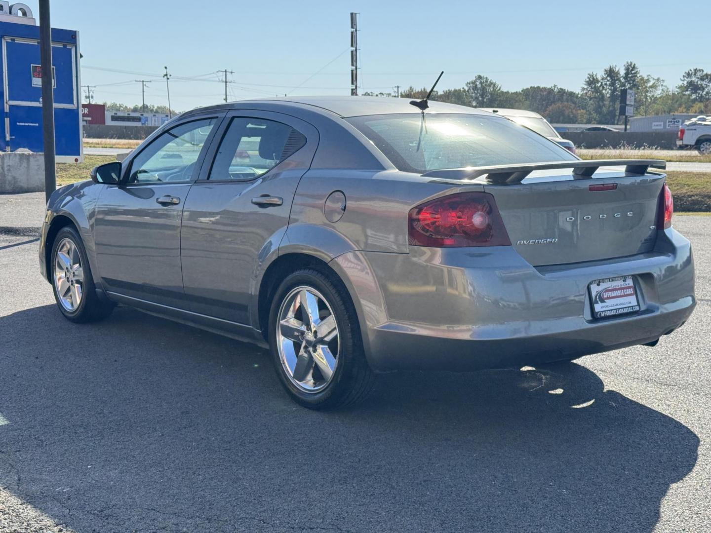 2013 Silver Dodge Avenger (1C3CDZCB9DN) with an 4-Cyl, 2.4 Liter engine, Automatic, 6-Spd w/AutoStick transmission, located at 8008 Warden Rd, Sherwood, AR, 72120, (501) 801-6100, 34.830078, -92.186684 - Photo#5