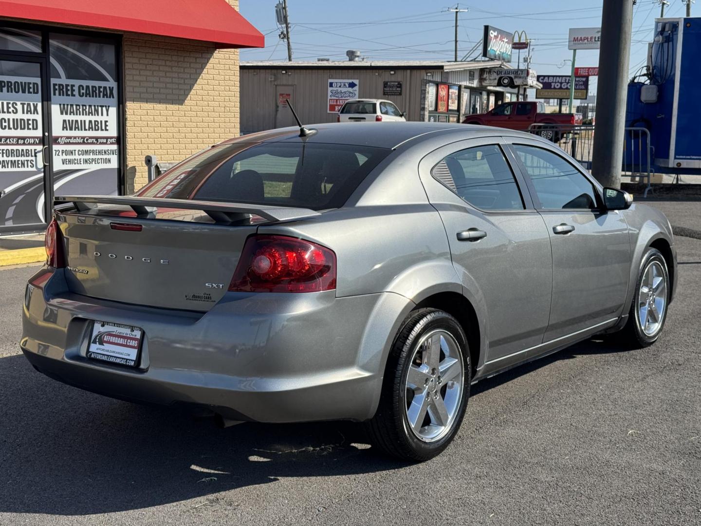 2013 Silver Dodge Avenger (1C3CDZCB9DN) with an 4-Cyl, 2.4 Liter engine, Automatic, 6-Spd w/AutoStick transmission, located at 8008 Warden Rd, Sherwood, AR, 72120, (501) 801-6100, 34.830078, -92.186684 - Photo#7