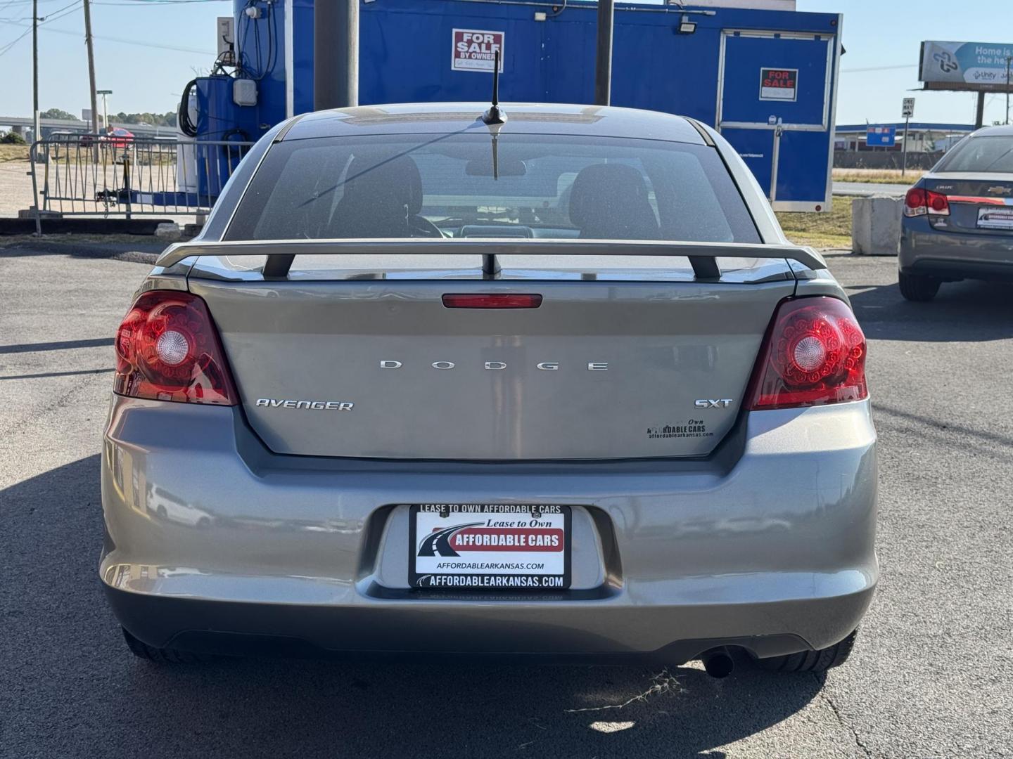 2013 Silver Dodge Avenger (1C3CDZCB9DN) with an 4-Cyl, 2.4 Liter engine, Automatic, 6-Spd w/AutoStick transmission, located at 8008 Warden Rd, Sherwood, AR, 72120, (501) 801-6100, 34.830078, -92.186684 - Photo#6