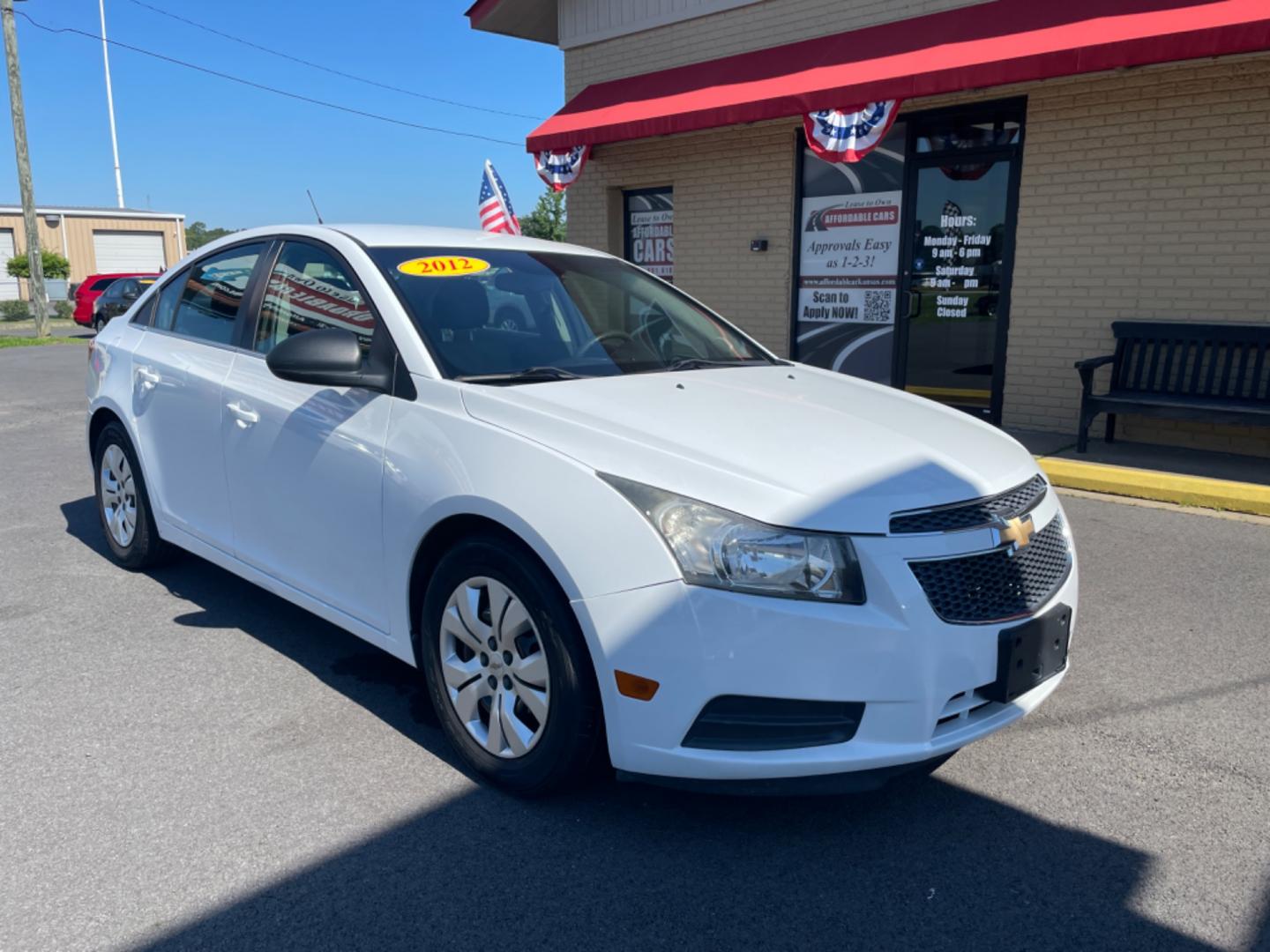 2012 White Chevrolet Cruze (1G1PC5SH8C7) with an 4-Cyl, 1.8 Liter engine, Automatic, 6-Spd w/Overdrive transmission, located at 8008 Warden Rd, Sherwood, AR, 72120, (501) 801-6100, 34.830078, -92.186684 - Photo#1