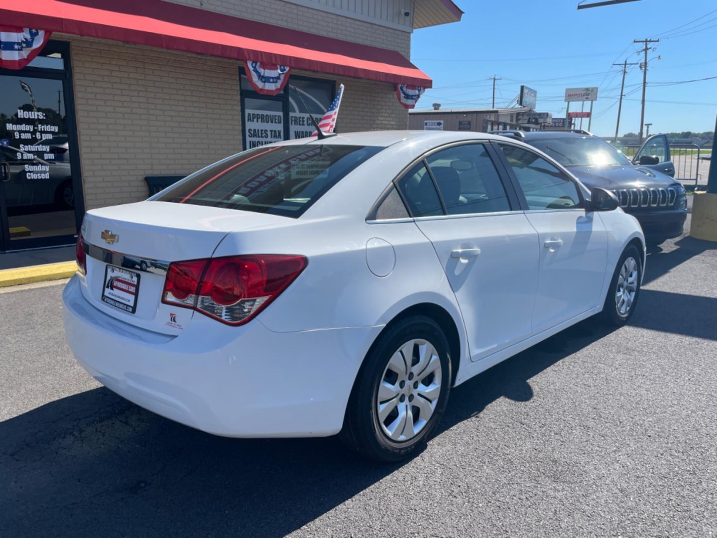 2012 White Chevrolet Cruze (1G1PC5SH8C7) with an 4-Cyl, 1.8 Liter engine, Automatic, 6-Spd w/Overdrive transmission, located at 8008 Warden Rd, Sherwood, AR, 72120, (501) 801-6100, 34.830078, -92.186684 - Photo#7