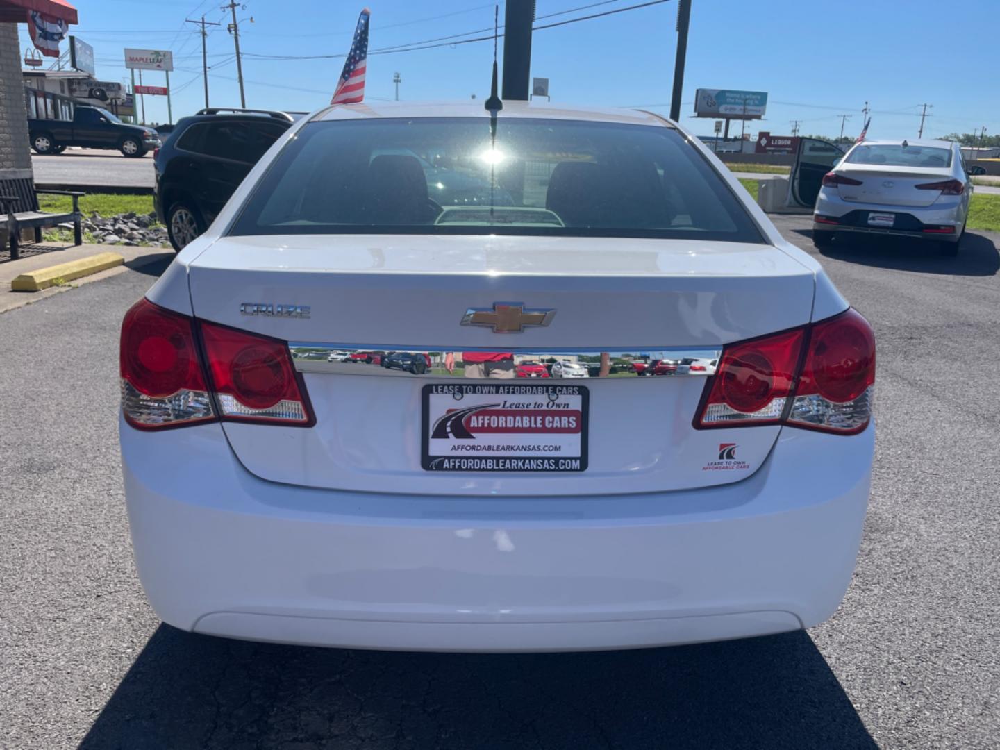 2012 White Chevrolet Cruze (1G1PC5SH8C7) with an 4-Cyl, 1.8 Liter engine, Automatic, 6-Spd w/Overdrive transmission, located at 8008 Warden Rd, Sherwood, AR, 72120, (501) 801-6100, 34.830078, -92.186684 - Photo#6