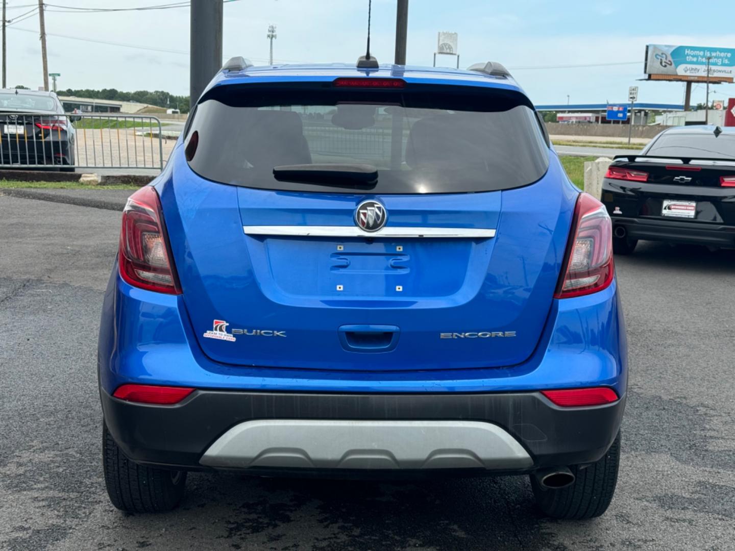 2018 Blue Buick Encore (KL4CJCSB4JB) with an 4-Cyl, Turbo, 1.4 Liter engine, Auto, 6-Spd OD ShftCtrl transmission, located at 8008 Warden Rd, Sherwood, AR, 72120, (501) 801-6100, 34.830078, -92.186684 - Photo#6