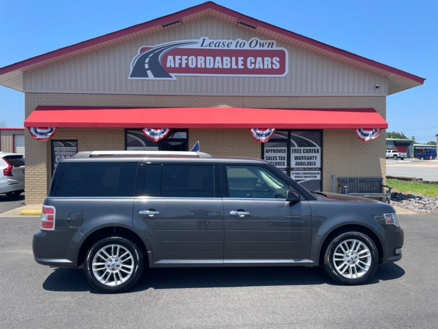 2015 Silver Ford Flex (2FMGK5C85FB) with an V6, 3.5 Liter engine, Automatic, 6-Spd w/SelectShift transmission, located at 8008 Warden Rd, Sherwood, AR, 72120, (501) 801-6100, 34.830078, -92.186684 - Photo#0