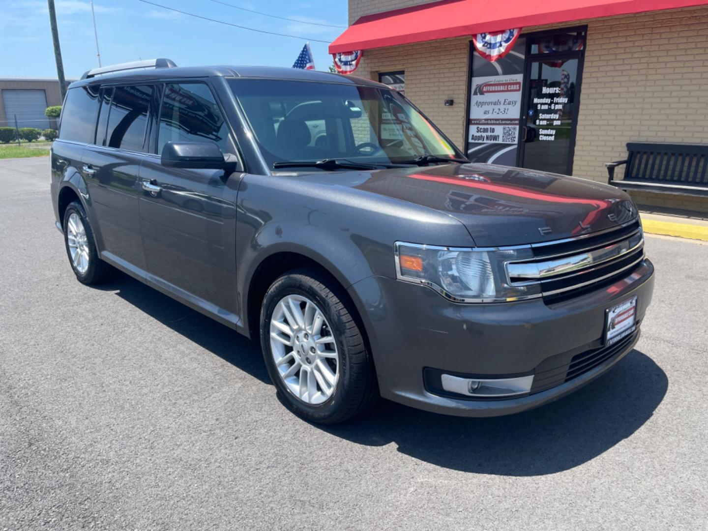 2015 Silver Ford Flex (2FMGK5C85FB) with an V6, 3.5 Liter engine, Automatic, 6-Spd w/SelectShift transmission, located at 8008 Warden Rd, Sherwood, AR, 72120, (501) 801-6100, 34.830078, -92.186684 - Photo#1