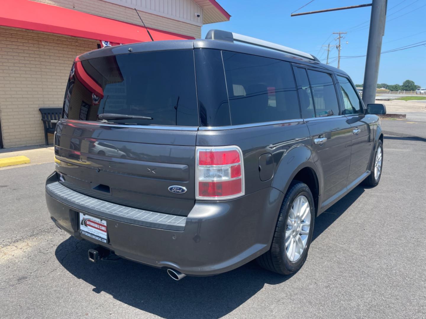 2015 Silver Ford Flex (2FMGK5C85FB) with an V6, 3.5 Liter engine, Automatic, 6-Spd w/SelectShift transmission, located at 8008 Warden Rd, Sherwood, AR, 72120, (501) 801-6100, 34.830078, -92.186684 - Photo#7