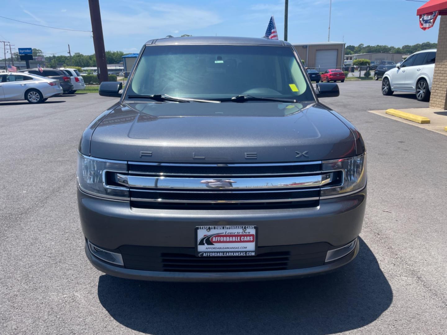 2015 Silver Ford Flex (2FMGK5C85FB) with an V6, 3.5 Liter engine, Automatic, 6-Spd w/SelectShift transmission, located at 8008 Warden Rd, Sherwood, AR, 72120, (501) 801-6100, 34.830078, -92.186684 - Photo#2