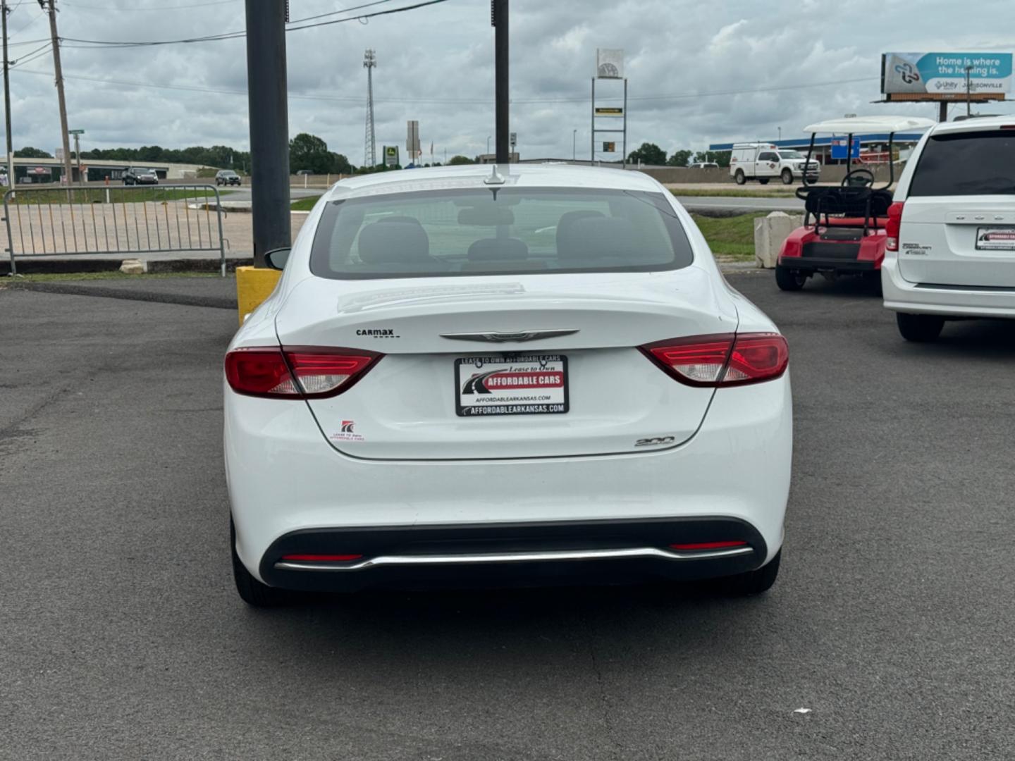 2015 White Chrysler 200 (1C3CCCAB6FN) with an 4-Cyl, MultiAir, 2.4L engine, Automatic, 9-Spd transmission, located at 8008 Warden Rd, Sherwood, AR, 72120, (501) 801-6100, 34.830078, -92.186684 - Photo#6