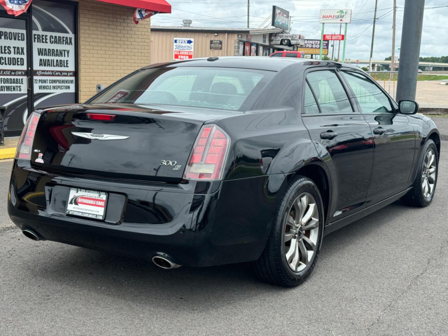 2014 Black Chrysler 300 (2C3CCAGG4EH) with an V6, 3.6 Liter engine, Automatic, 8-Spd transmission, located at 8008 Warden Rd, Sherwood, AR, 72120, (501) 801-6100, 34.830078, -92.186684 - Photo#7