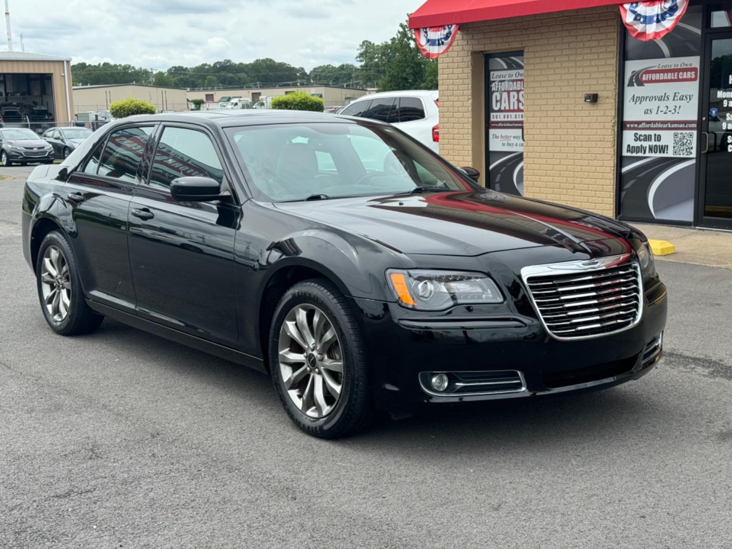 2014 Black Chrysler 300 (2C3CCAGG4EH) with an V6, 3.6 Liter engine, Automatic, 8-Spd transmission, located at 8008 Warden Rd, Sherwood, AR, 72120, (501) 801-6100, 34.830078, -92.186684 - Photo#1