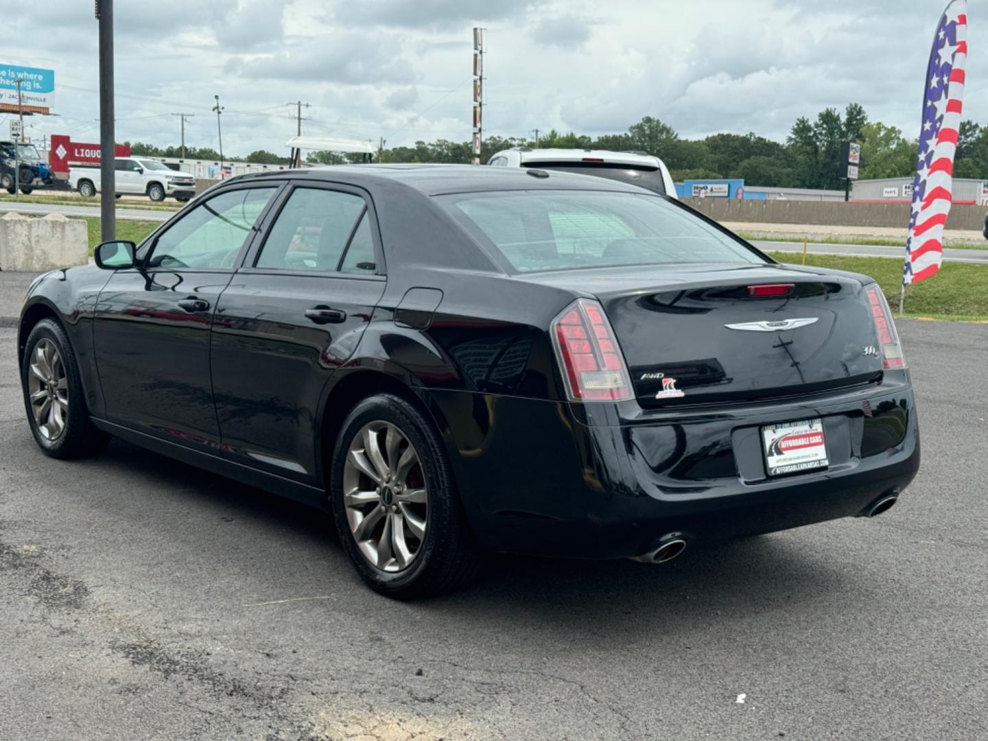 2014 Black Chrysler 300 (2C3CCAGG4EH) with an V6, 3.6 Liter engine, Automatic, 8-Spd transmission, located at 8008 Warden Rd, Sherwood, AR, 72120, (501) 801-6100, 34.830078, -92.186684 - Photo#5