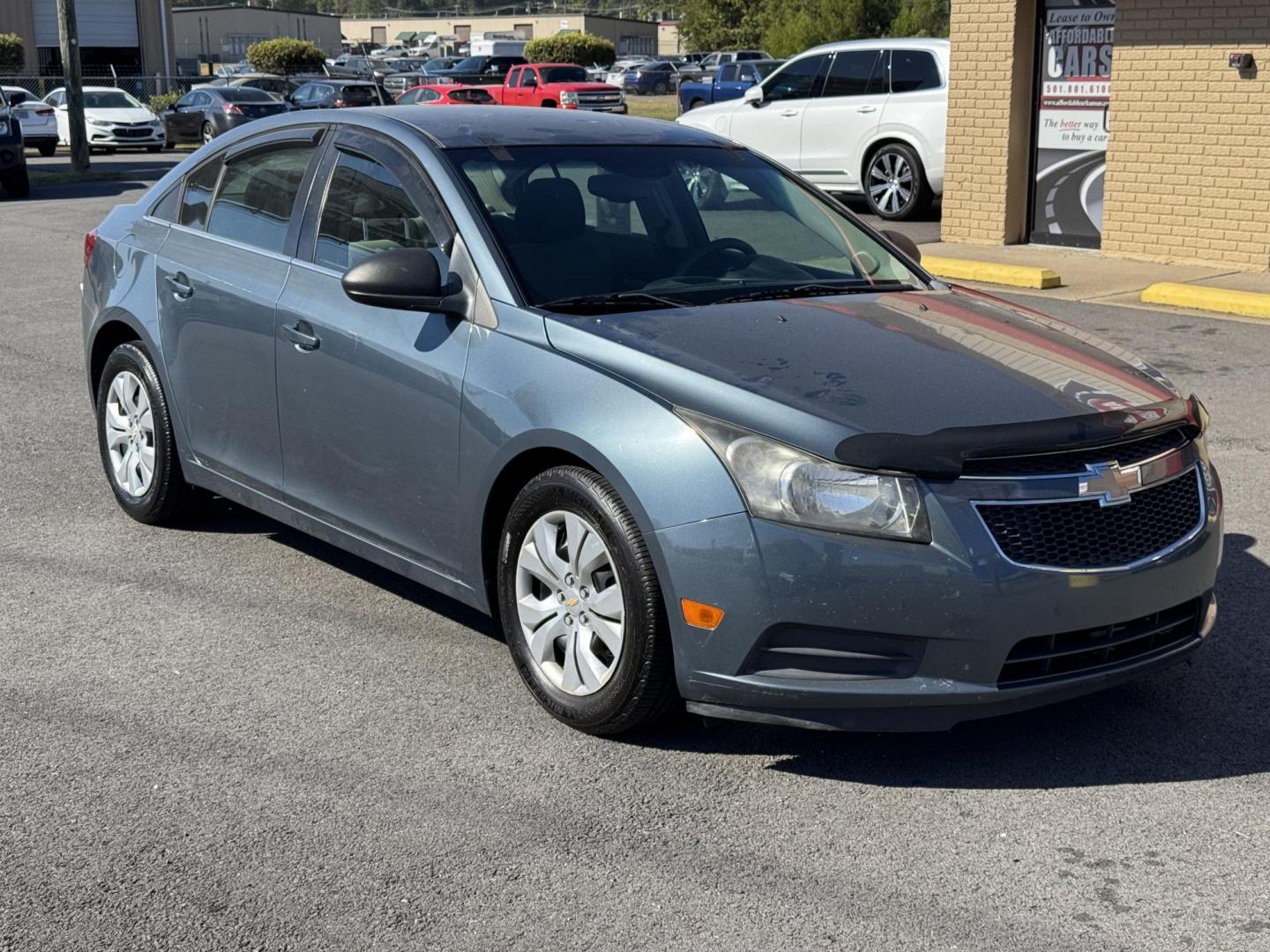 2012 Blue Chevrolet Cruze (1G1PC5SH0C7) with an 4-Cyl, 1.8 Liter engine, Automatic, 6-Spd w/Overdrive transmission, located at 8008 Warden Rd, Sherwood, AR, 72120, (501) 801-6100, 34.830078, -92.186684 - Photo#2