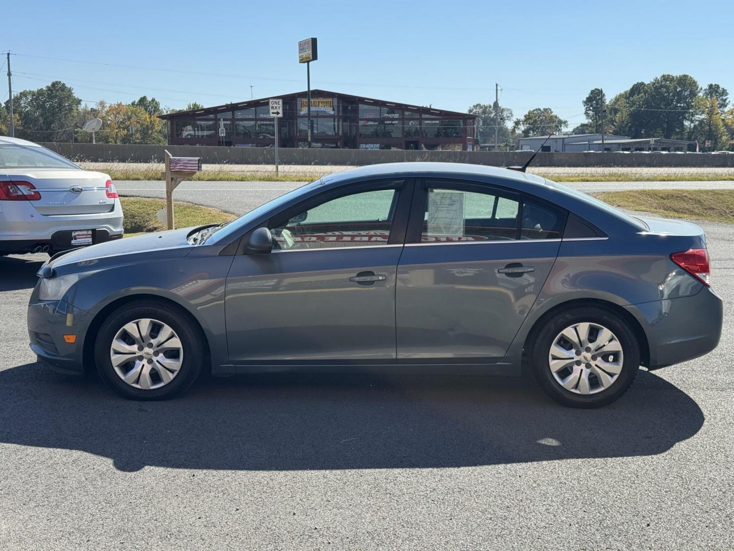 2012 Blue Chevrolet Cruze (1G1PC5SH0C7) with an 4-Cyl, 1.8 Liter engine, Automatic, 6-Spd w/Overdrive transmission, located at 8008 Warden Rd, Sherwood, AR, 72120, (501) 801-6100, 34.830078, -92.186684 - Photo#3