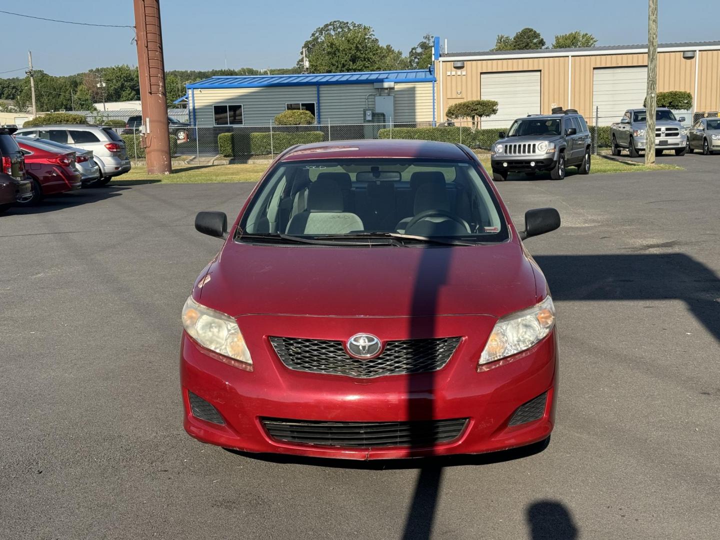 2009 Red Toyota Corolla (JTDBL40E499) with an 4-Cyl, 1.8 Liter engine, Automatic, 4-Spd w/Overdrive transmission, located at 8008 Warden Rd, Sherwood, AR, 72120, (501) 801-6100, 34.830078, -92.186684 - Photo#0