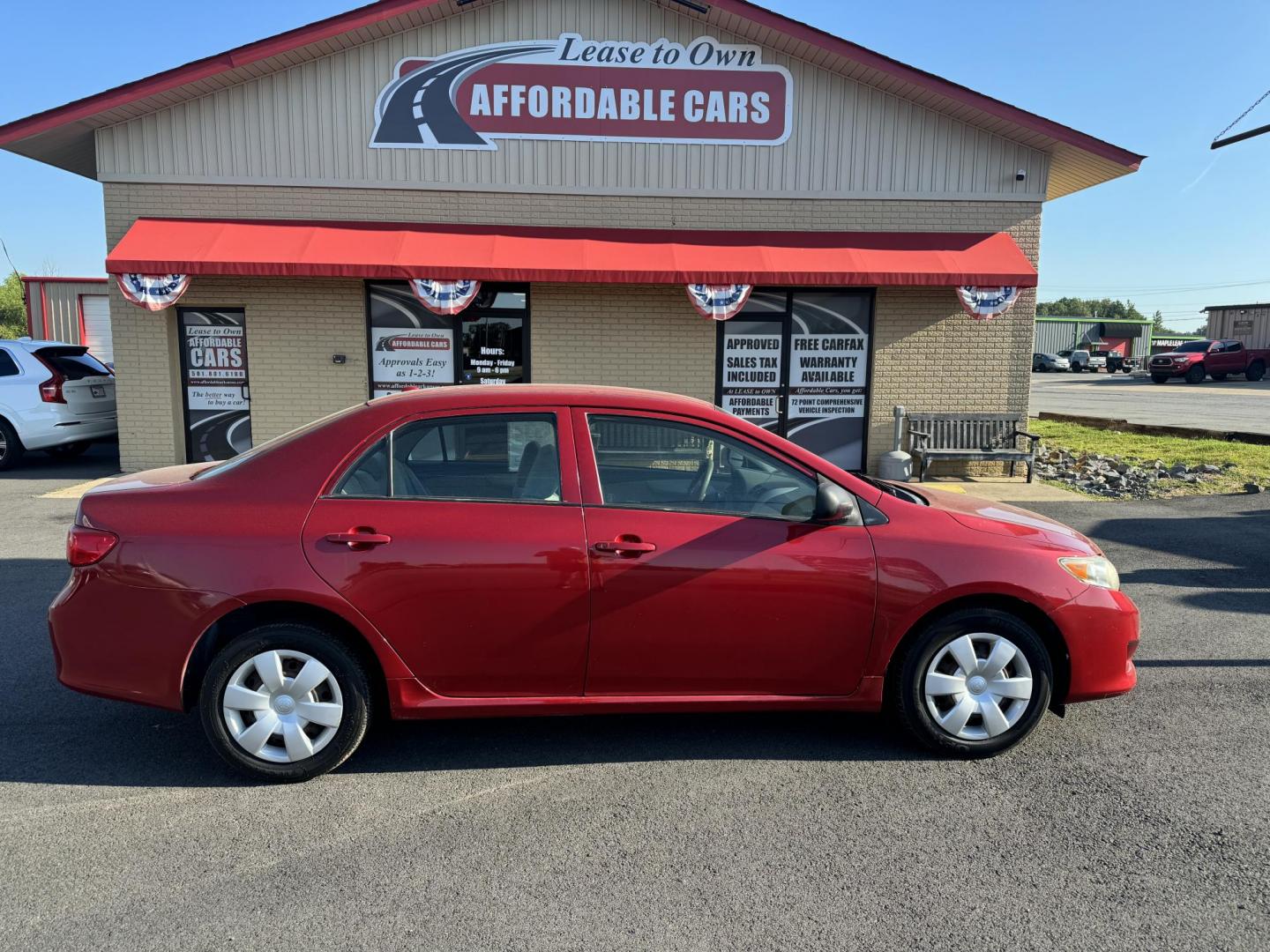 2009 Red Toyota Corolla (JTDBL40E499) with an 4-Cyl, 1.8 Liter engine, Automatic, 4-Spd w/Overdrive transmission, located at 8008 Warden Rd, Sherwood, AR, 72120, (501) 801-6100, 34.830078, -92.186684 - Photo#1